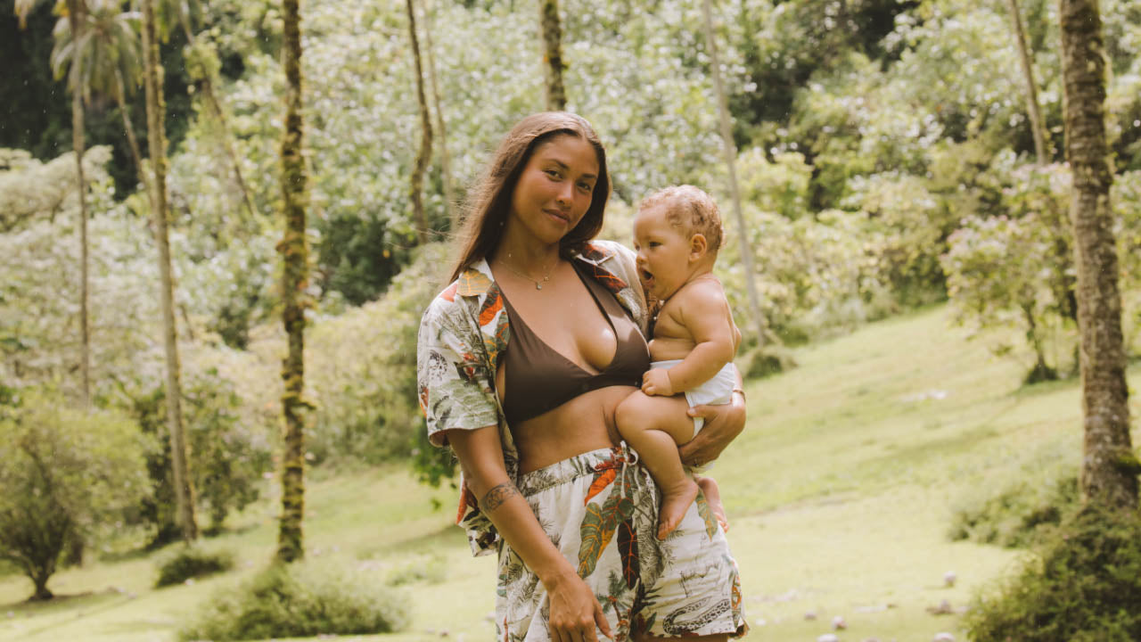 Hinatea holding her baby