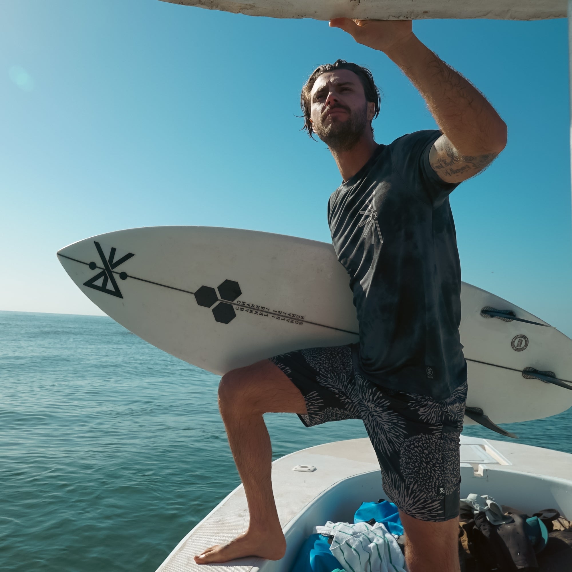 Surfboard on sandy beach, showcasing the adventurous spirit of water sports, ideal for outdoor enthusiasts